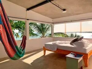 1200-004-Casa-Maya-Hostal-Hotel-Playa-El-Yaque-Isla-Margarita-Venezuela-es-habitacion202-387x290